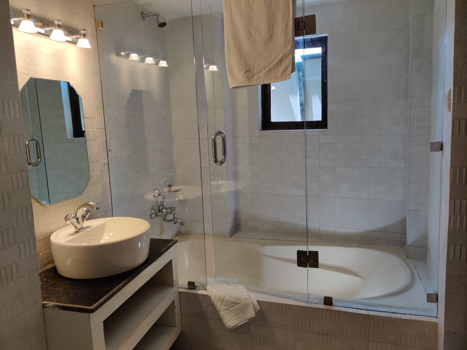 Luxury Room | Bathroom | Hair dryer, slippers, towels, soap
