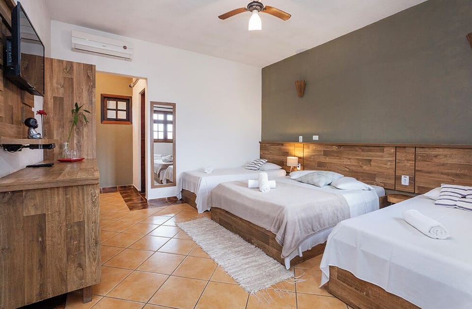 Ground Floor Garden | Minibar, blackout drapes, free cribs/infant beds, free WiFi