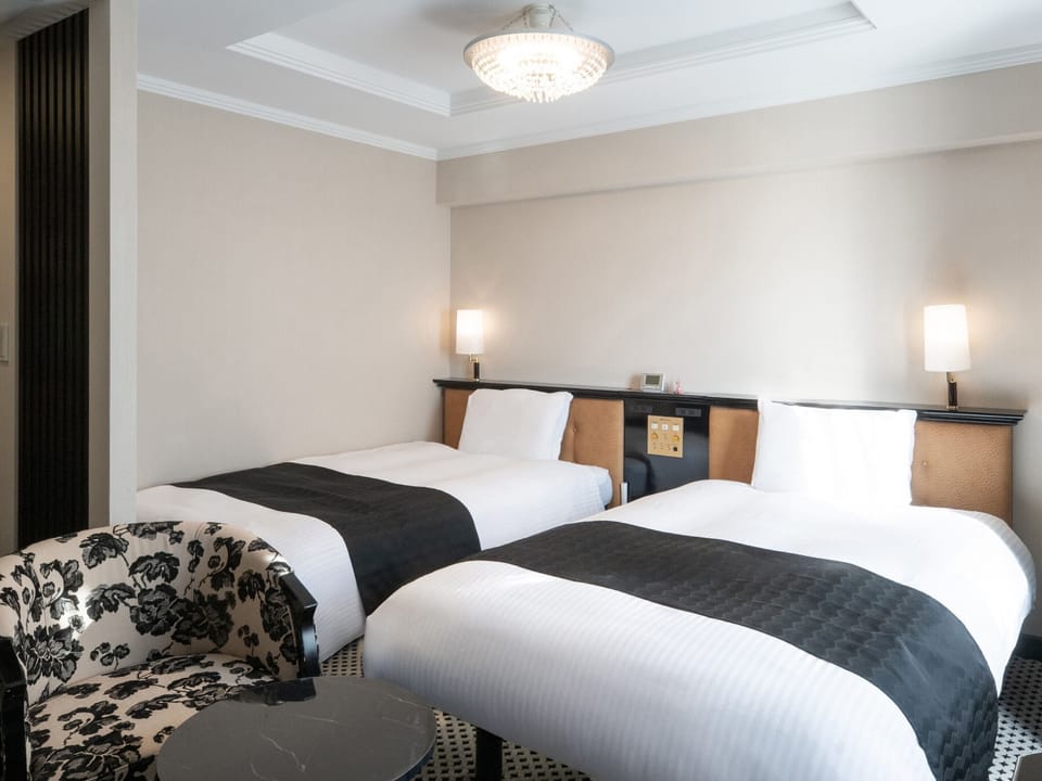 Deluxe Twin Room, Non Smoking | Premium bedding, down comforters, desk, blackout drapes