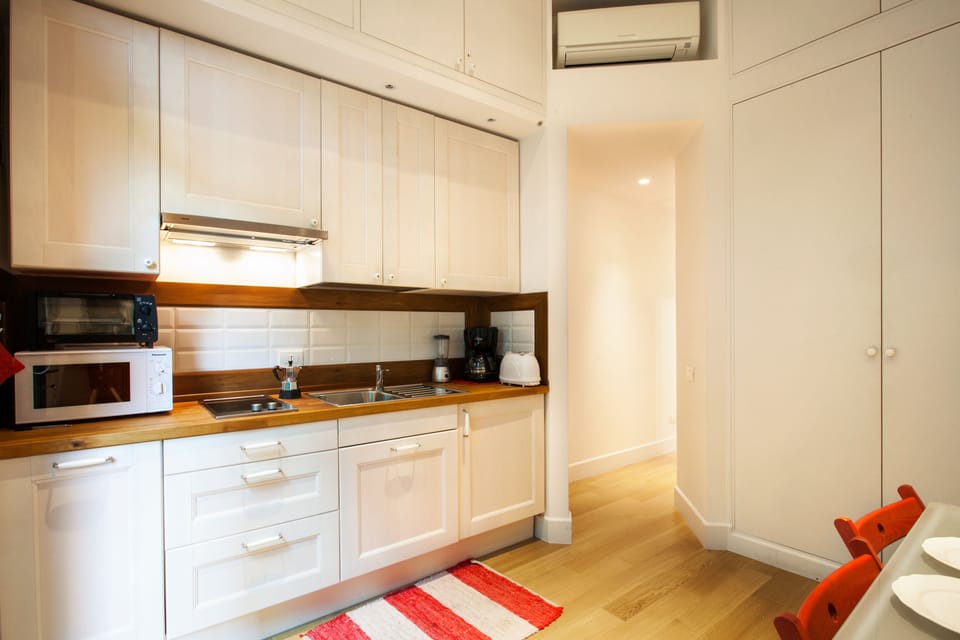 Apartment, 1 Bedroom | Private kitchen | Full-size fridge, microwave, stovetop, coffee/tea maker