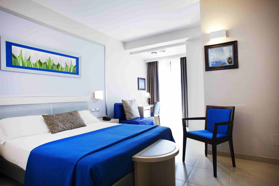 Superior Double Room, Sea View | Hypo-allergenic bedding available, minibar, in-room safe, desk