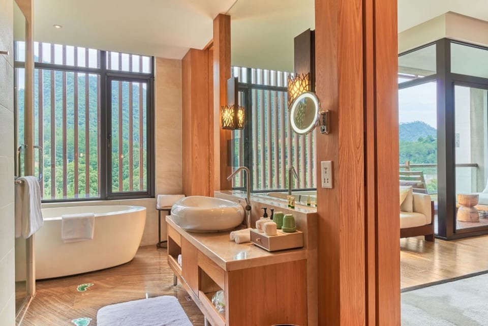 Separate tub and shower, rainfall showerhead, hair dryer, bathrobes