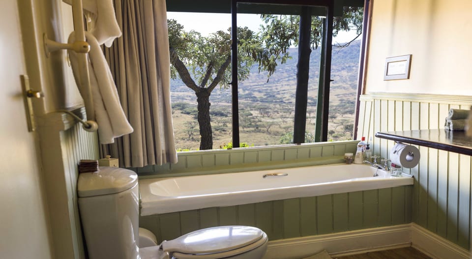 Separate tub and shower, eco-friendly toiletries, hair dryer, bathrobes