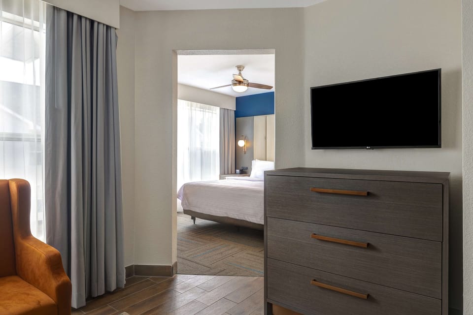 Premium bedding, blackout drapes, iron/ironing board
