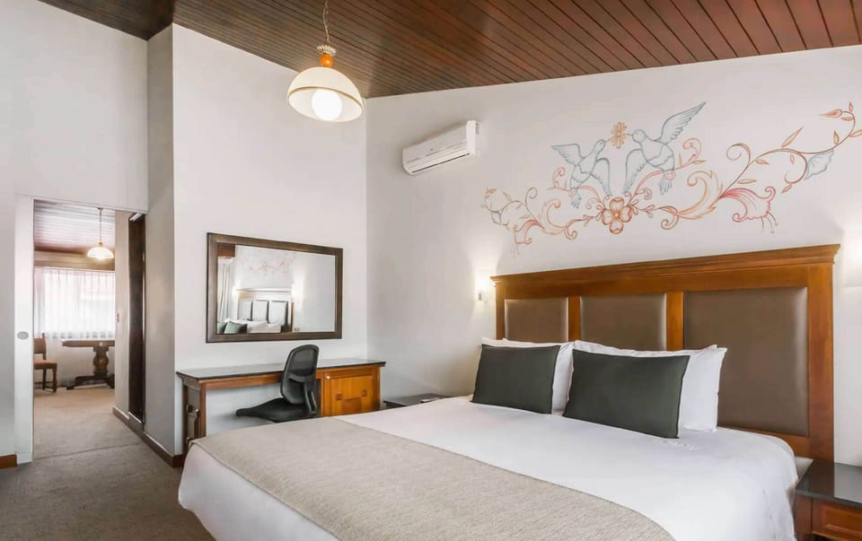 Superior Suite, 1 King Bed, Non Smoking | Premium bedding, down comforters, minibar, in-room safe