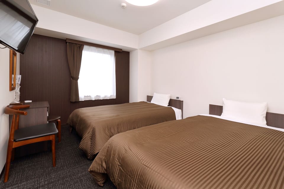 Desk, iron/ironing board (on request), WiFi (free), bed sheets