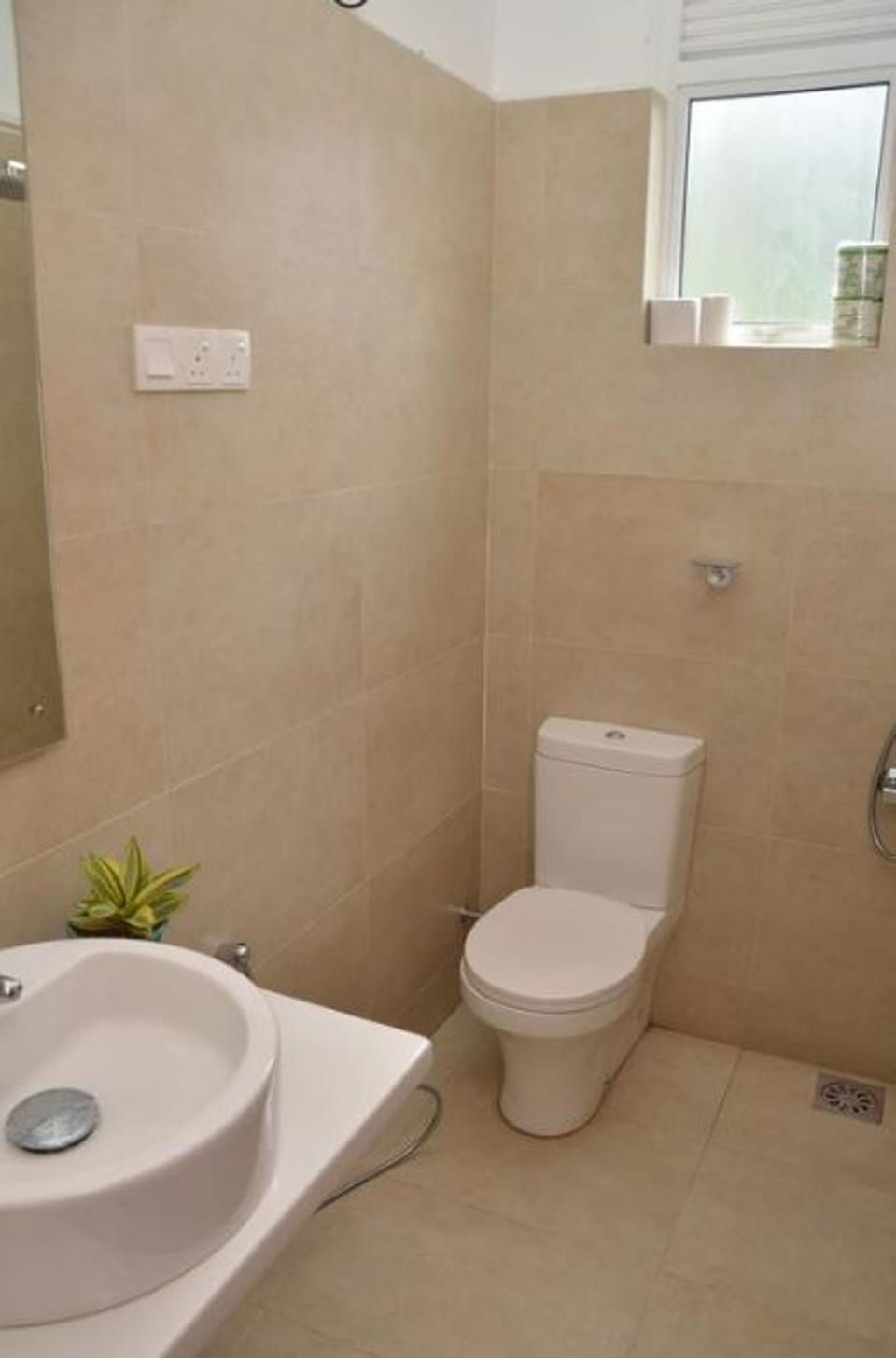 Shower, rainfall showerhead, bidet, towels