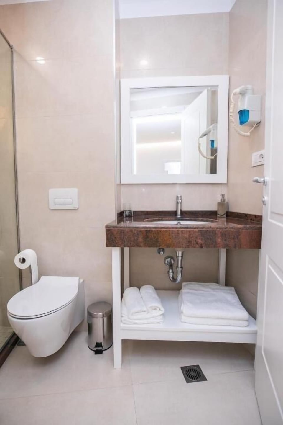 Shower, free toiletries, hair dryer, slippers