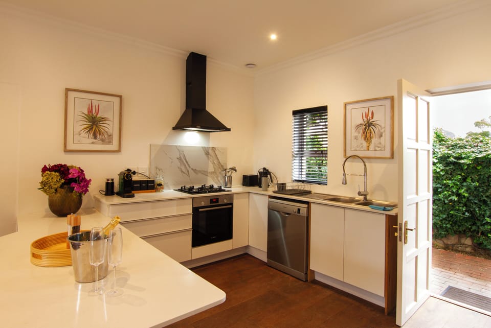 Executive Suite, Non Smoking, Pool View | Private kitchen | Espresso maker, electric kettle