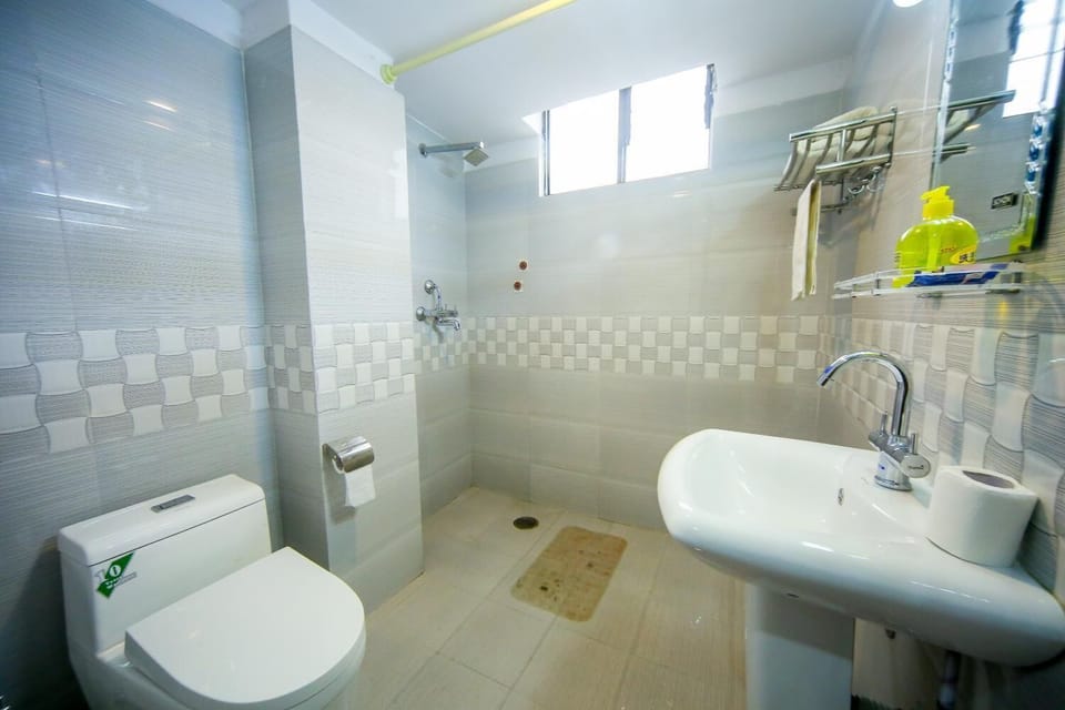 Shower, free toiletries, slippers, towels