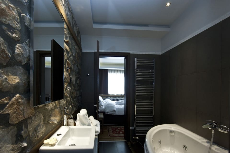 Jetted tub, free toiletries, hair dryer, bathrobes