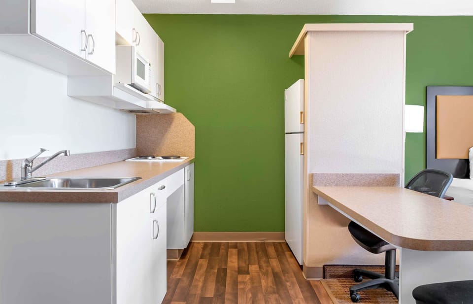 Studio, 1 Queen Bed, Non Smoking | Private kitchen | Fridge, microwave, stovetop, coffee/tea maker