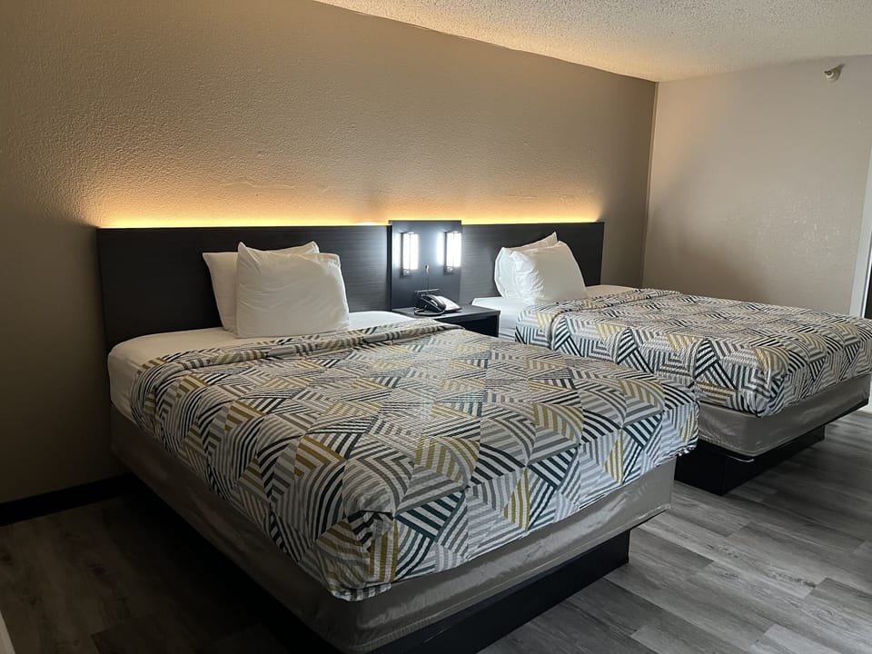 Desk, laptop workspace, WiFi (free), bed sheets