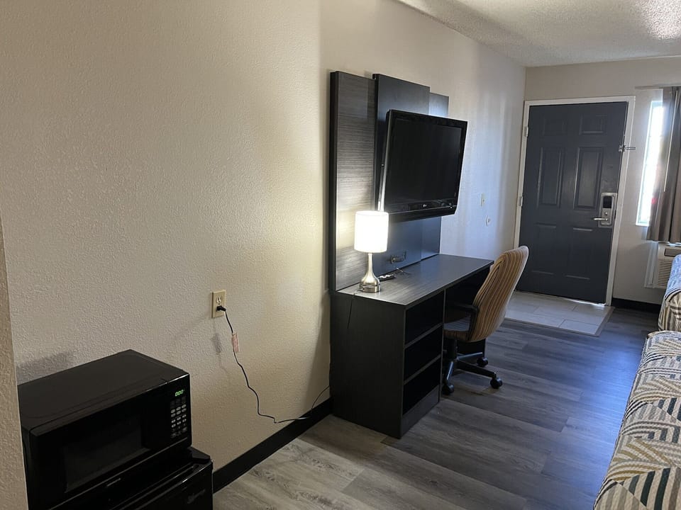 Desk, laptop workspace, WiFi (free), bed sheets