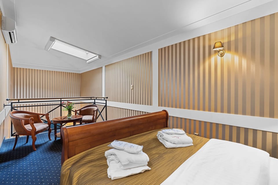 Standard Apartment, 1 King Bed | Desk, iron/ironing board, free cribs/infant beds, free WiFi