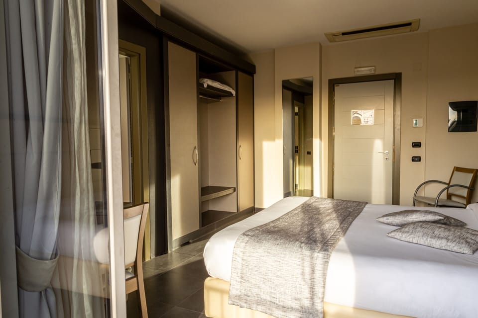 Standard Double Room, Balcony | Minibar, in-room safe, desk, blackout drapes