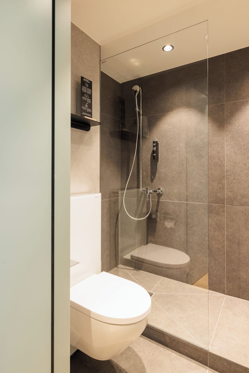 Shower, eco-friendly toiletries, hair dryer, towels