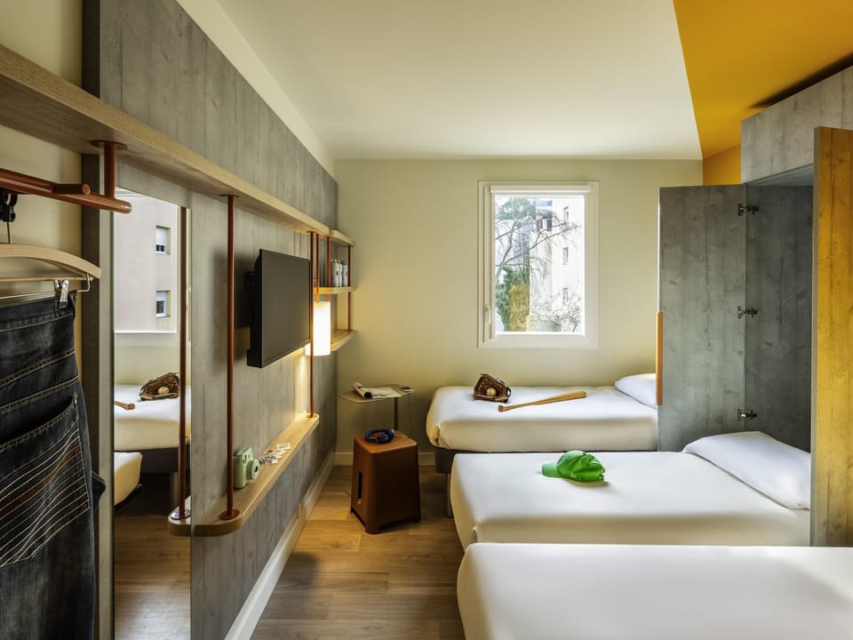 Triple Room, Multiple Beds | Individually furnished, laptop workspace, soundproofing, free WiFi