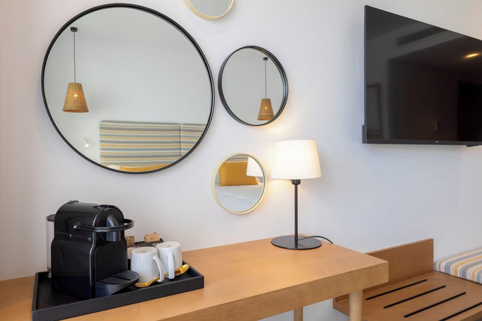 Double Room, Balcony (Partial Beach View) | In-room safe, desk, free WiFi, bed sheets