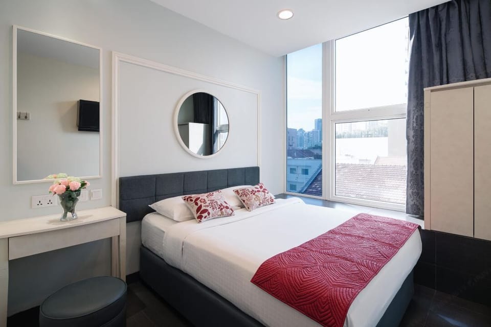 Premium bedding, desk, blackout drapes, iron/ironing board (on request)