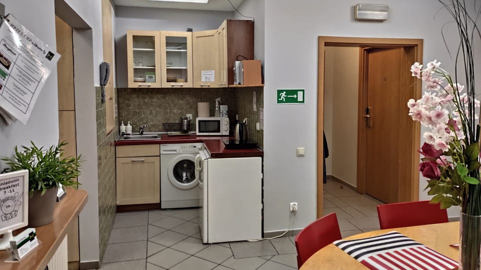 Mini-fridge, microwave, stovetop, coffee/tea maker