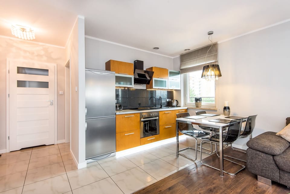 Comfort Apartment | Private kitchen | Full-size fridge, oven, stovetop, electric kettle