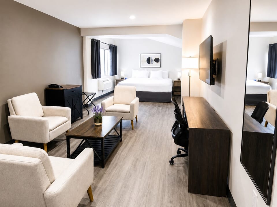 Suite, 1 King Bed, Non Smoking | Hypo-allergenic bedding available, desk, laptop workspace