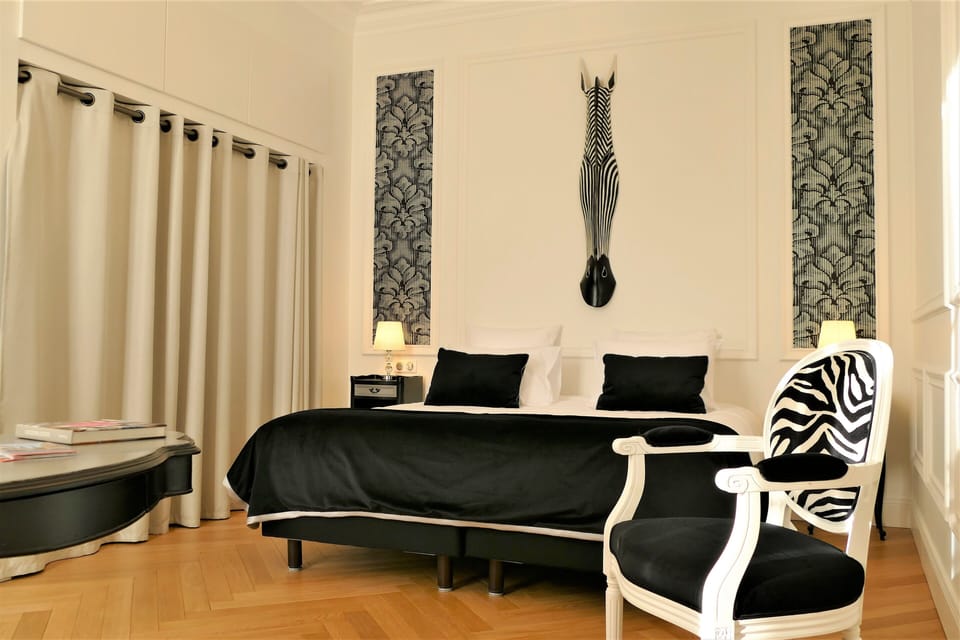 Deluxe Suite, Garden View (Dijeaux) | 1 bedroom, premium bedding, in-room safe, laptop workspace