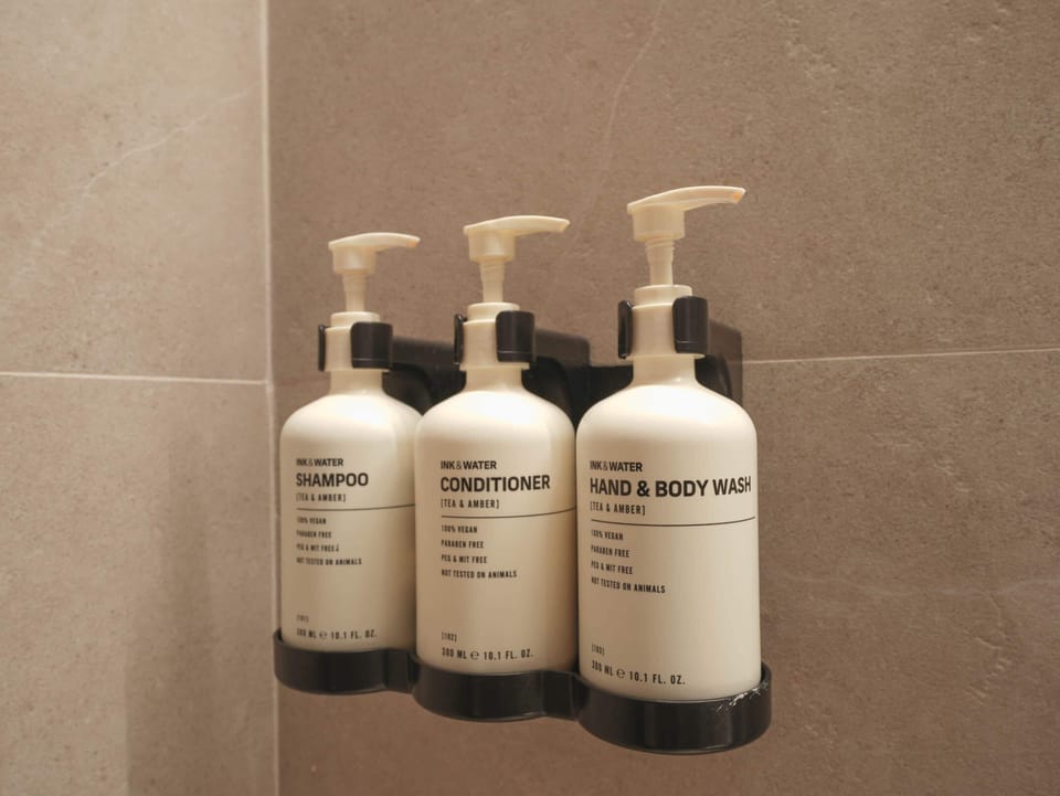 Shower, rainfall showerhead, free toiletries, hair dryer