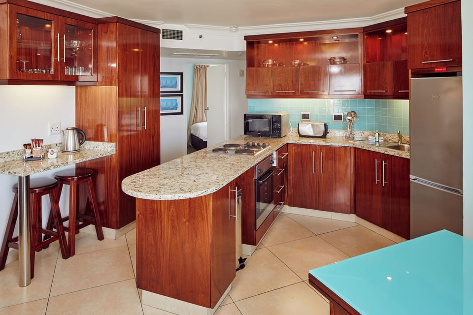 Standard Apartment, 2 Bedrooms, Mobility Accessible, Sea View | Private kitchen | Coffee/tea maker, electric kettle, cookware/dishes/utensils