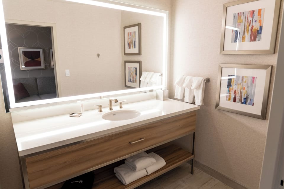Eco-friendly toiletries, hair dryer, towels