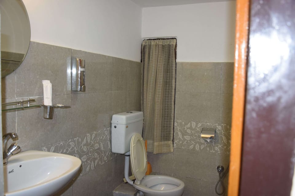 Shower, hydromassage showerhead, slippers, towels