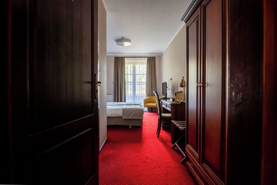 Desk, blackout drapes, iron/ironing board (on request), WiFi (free)