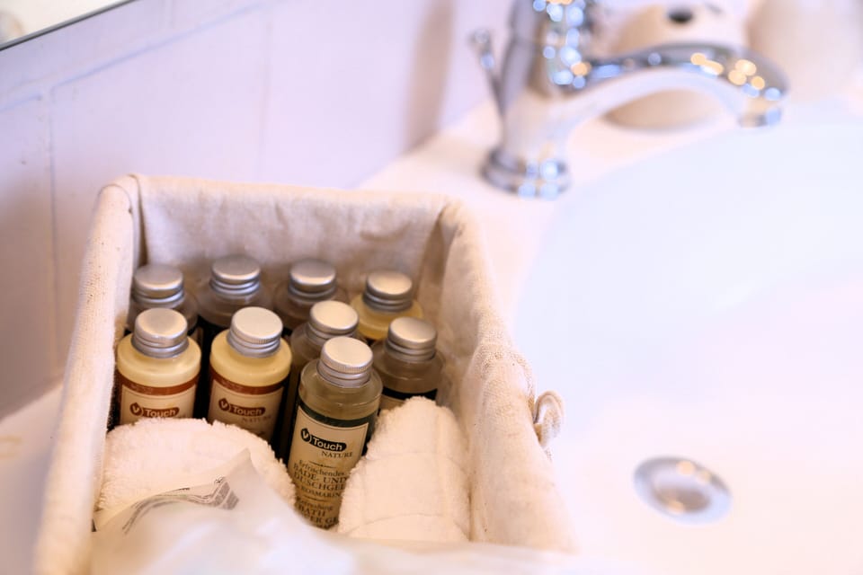Deluxe Room | Bathroom amenities | Free toiletries, hair dryer, bathrobes, slippers