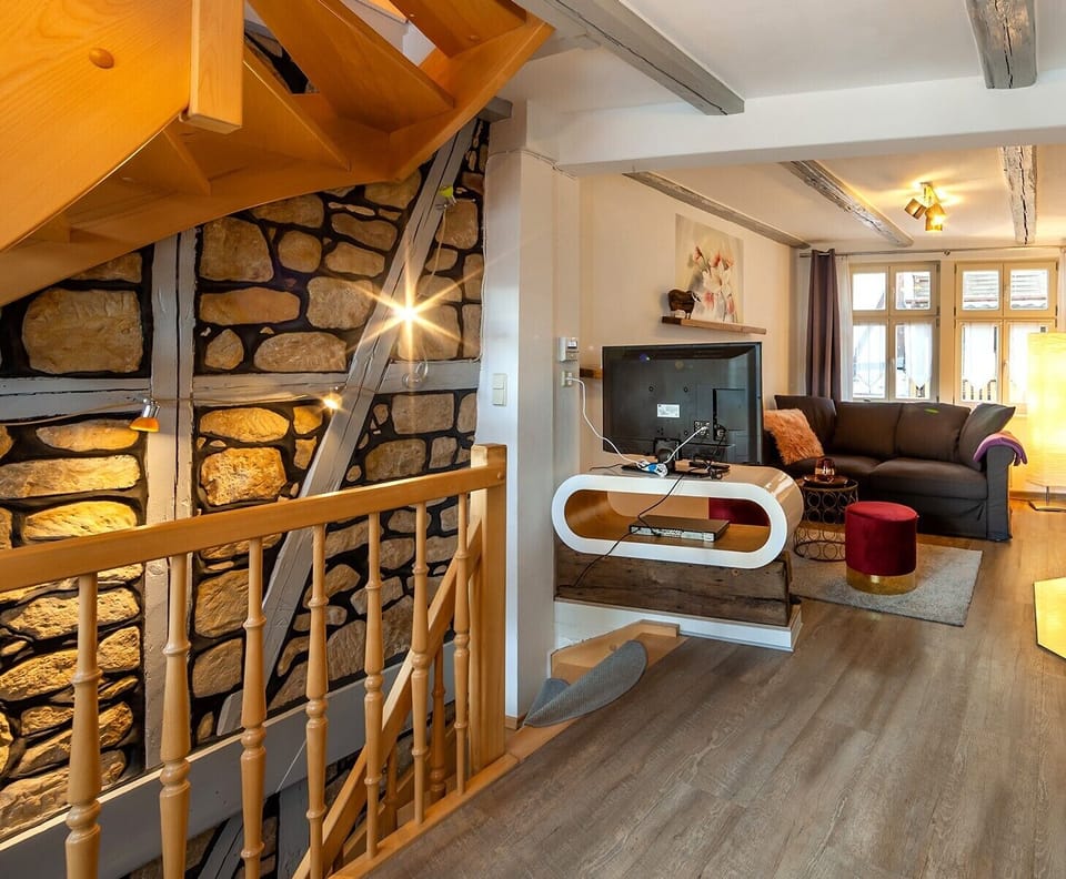 Apartment, 1 Bedroom, Terrace | Living area | Flat-screen TV, fireplace, toys