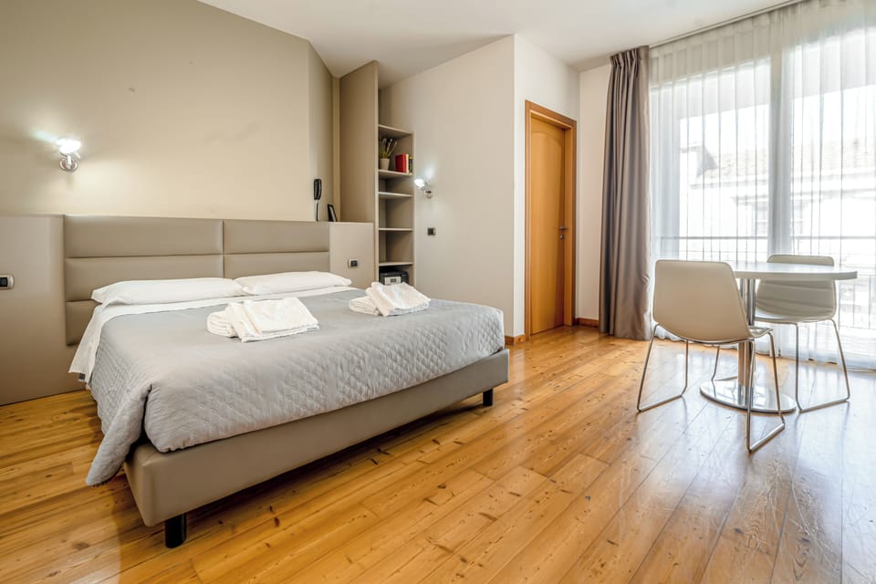 Superior Double or Twin Room | Minibar, in-room safe, desk, soundproofing