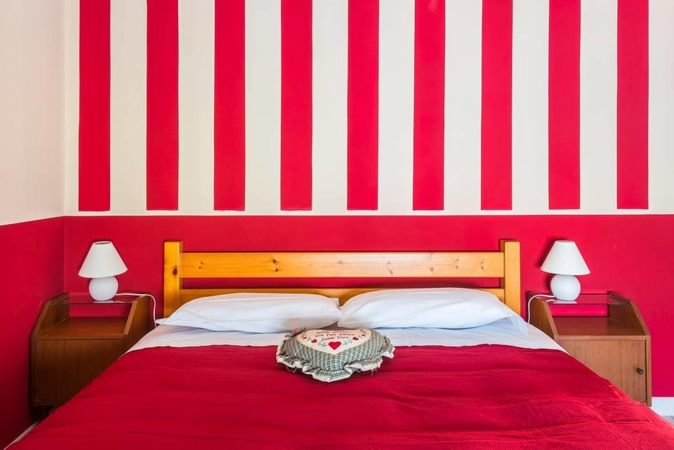 Quadruple Room | In-room safe, bed sheets