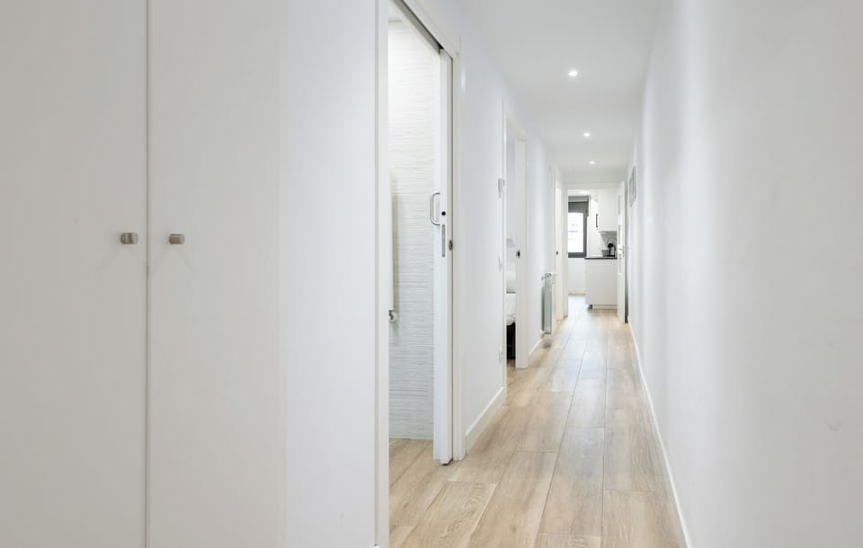 Apartment, 2 Bedrooms | Living area | 65-inch TV with cable channels