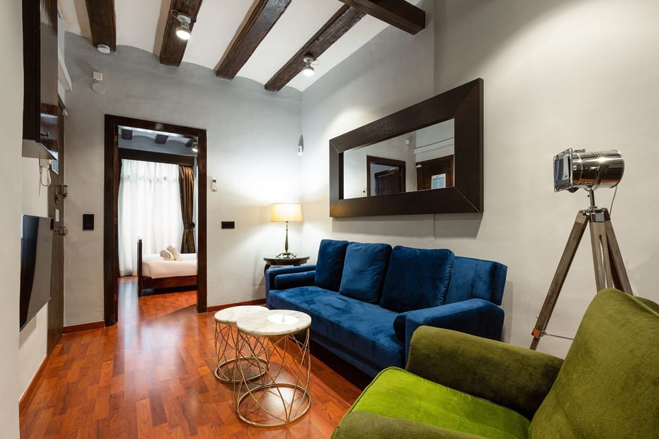 Apartment (2 Bedrooms) | Living area | 65-inch TV with cable channels