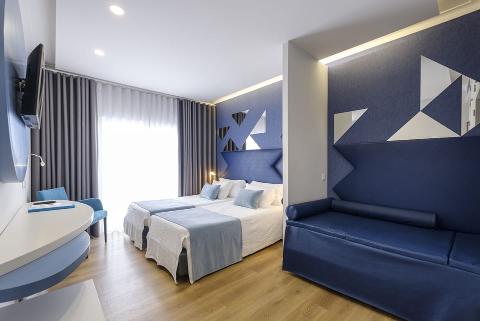 Hypo-allergenic bedding, blackout drapes, iron/ironing board, free WiFi