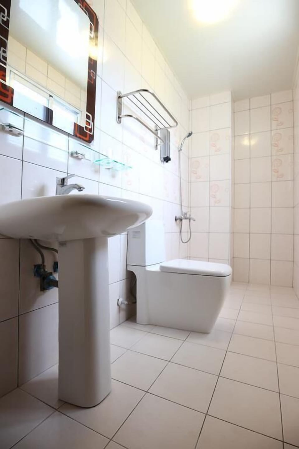 Shower, free toiletries, hair dryer, slippers