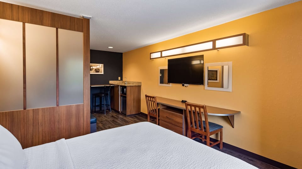 Hypo-allergenic bedding, pillowtop beds, desk, laptop workspace