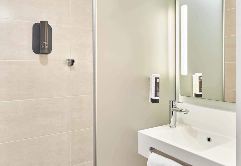 Shower, towels, soap, toilet paper