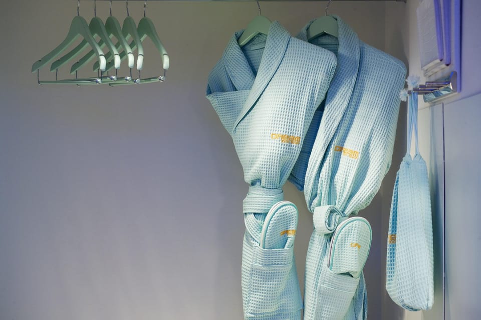 Shower, designer toiletries, hair dryer, bathrobes