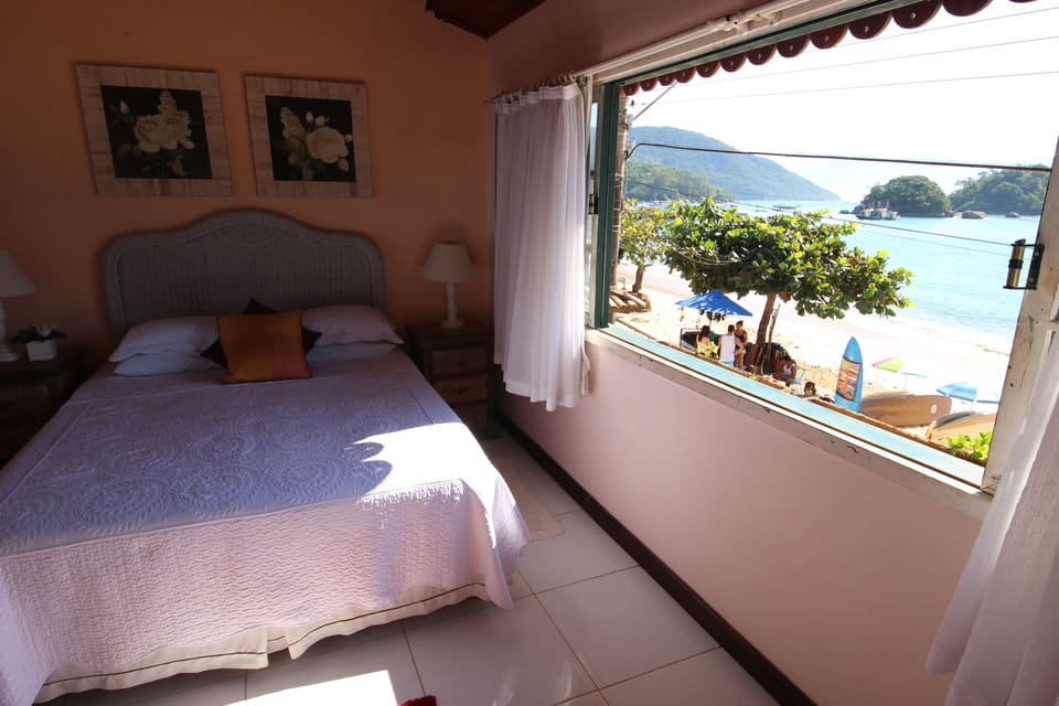 Panoramic Double Room | Down comforters, minibar, individually decorated, individually furnished