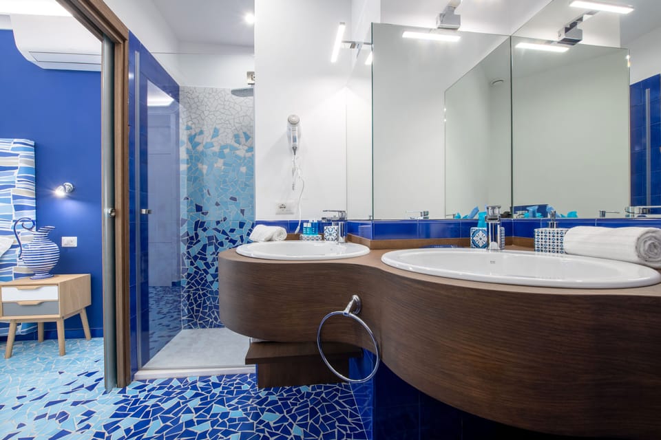 Deluxe Double or Twin Room, 1 Queen Bed, Balcony (Mosaico) | Bathroom | Shower, rainfall showerhead, free toiletries, hair dryer