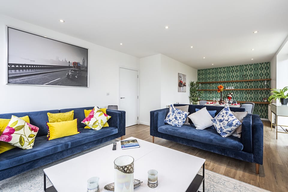 Three-Bedroom Apartment | Living area | 55-inch LED TV with digital channels, TV