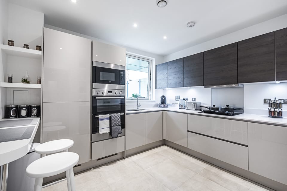 Three-Bedroom Apartment | Private kitchen | Full-size fridge, microwave, oven, stovetop