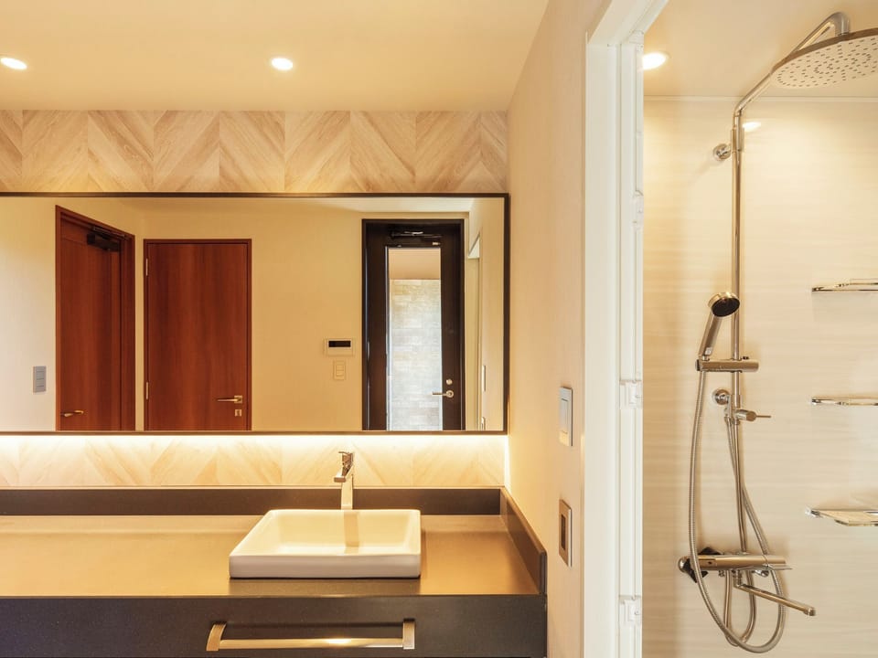[Newly Established in December 2024] Deluxe Twin(With open-air bath and terrace)(Non-Smoking) | Bathroom | Hair dryer, slippers, bidet, towels