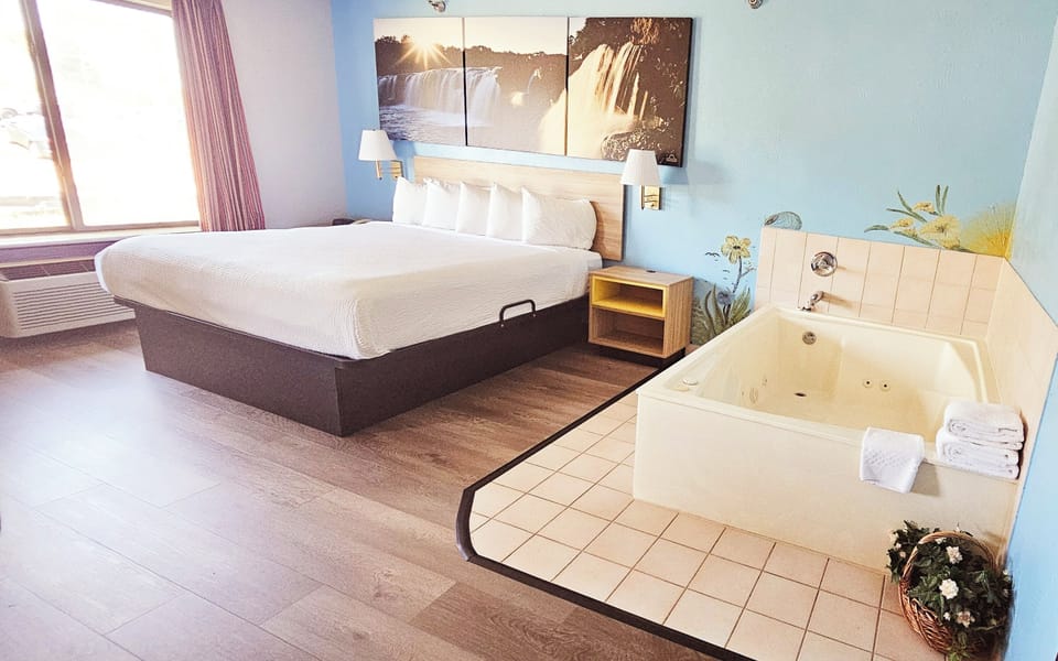 Suite, 1 King Bed, Non Smoking | Individually decorated, individually furnished, desk, iron/ironing board